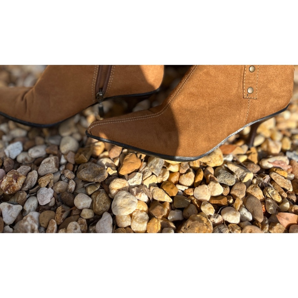 Brown suede boots.